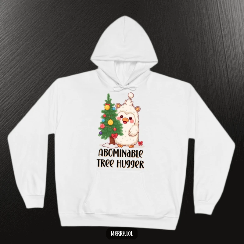 Funny hoodie featuring a playful yeti peeking from behind a Christmas tree, ideal for festive comfort.