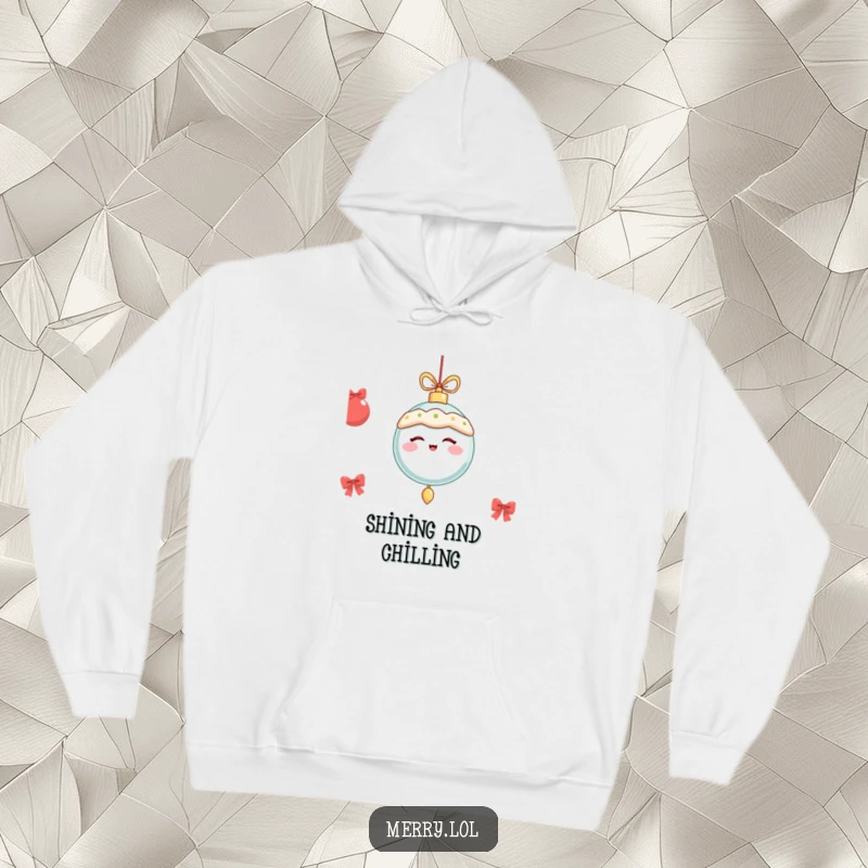 Funny festive ornament winking and dangling merrily, featured on a warm hoodie for comfortable holiday celebrations.