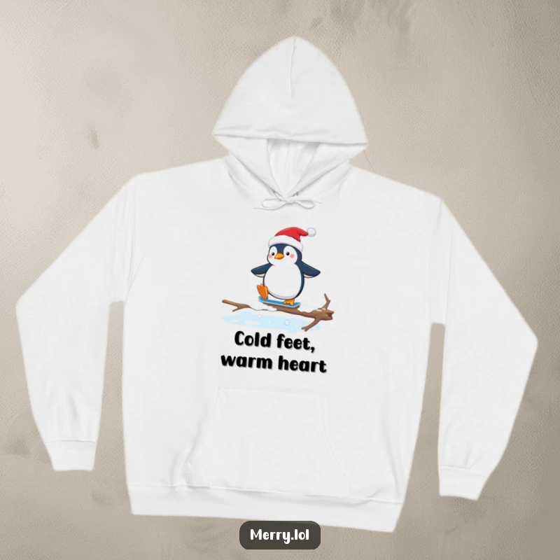 Funny hoodie depicting a penguin in a Santa hat attempting to ice skate on a slippery branch, showcasing holiday clumsiness.