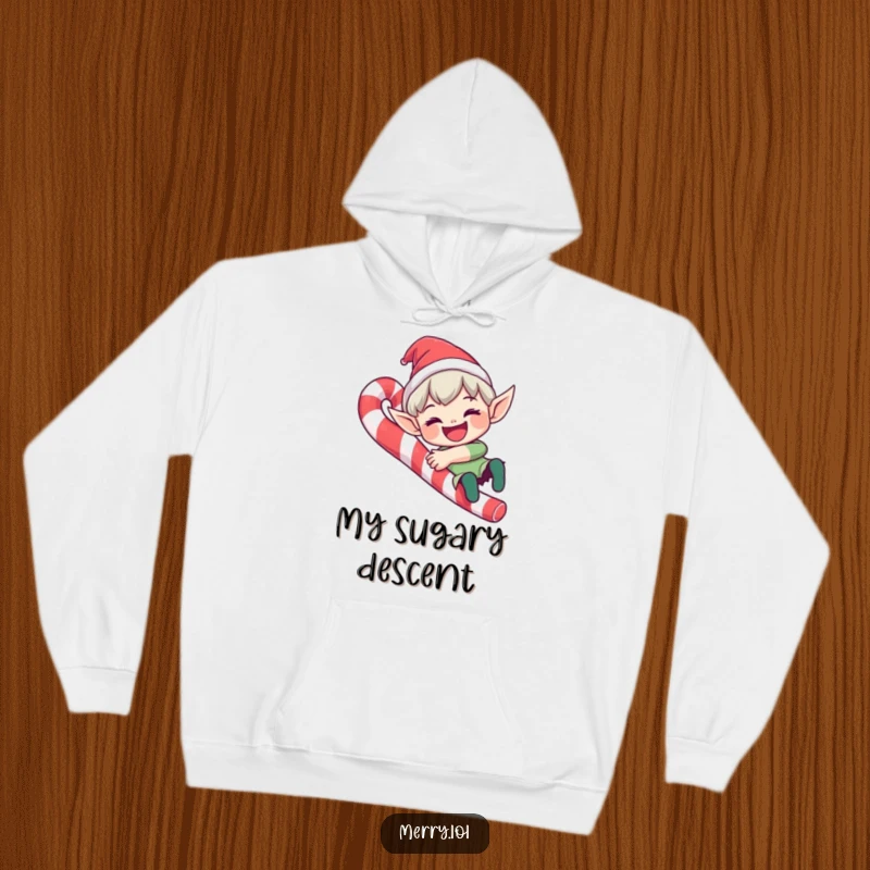 Funny hooded sweatshirt with a cute elf sliding down a candy cane with a wide grin, offering cozy humor.