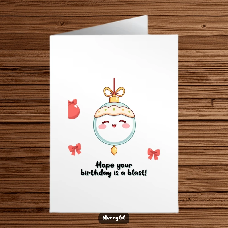 Free Printable Birthday Card: A festive ornament character winks with a dangling, merry motion.