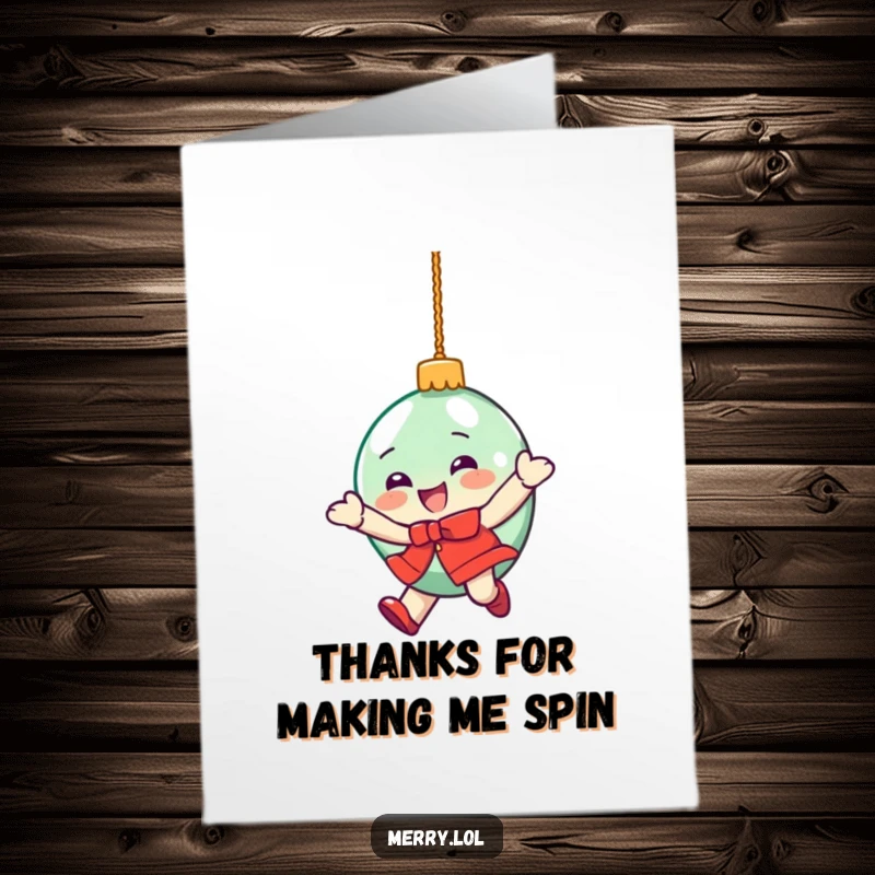 Funny free printable thank you card of a festive ornament character in a dizzying spin, conveying joy and thanks.
