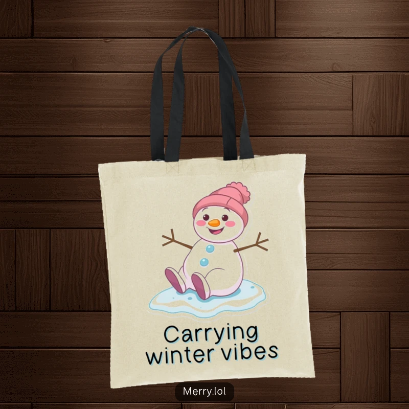 Funny tote bag featuring a grinning snowman character caught in a comical slip on icy terrain, perfect for winter fun.